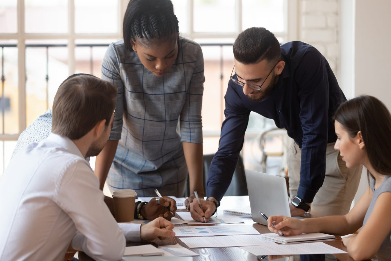 diverse workforce brainstorming in office