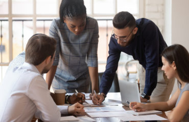 diverse workforce brainstorming in office